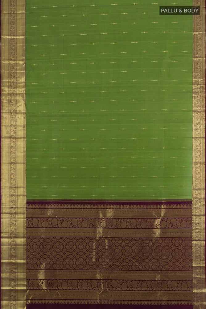 Flat view of Light Green Kanchipuram Silk Saree with Zari Butta on the body and Silk Border. 
