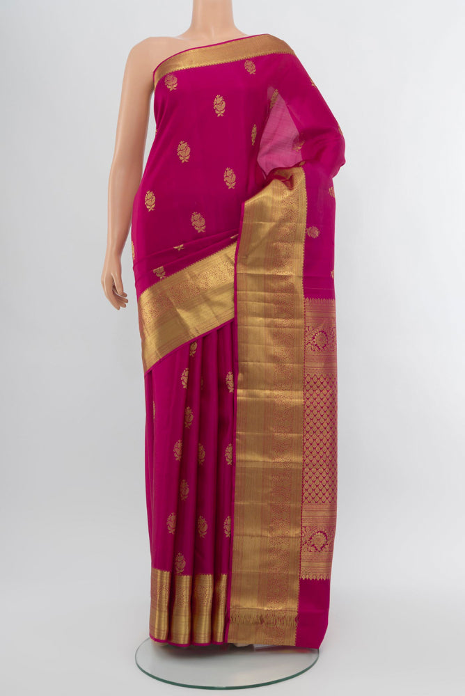 Dark Pink Kanjivaram Silk Saree with Zari Brocade on the body and Zari Border.  displayed on a mannequin