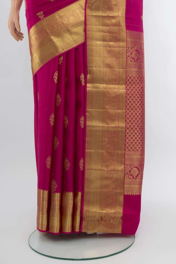Pleats and pallu of Dark Pink Kanjivaram Silk Saree with Zari Brocade on the body and Zari Border. 