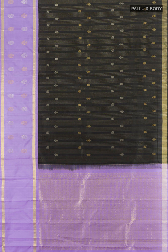 Flat view of Black Kanjivaram Silk Saree with Zari Butta on the body and Silk Border. 