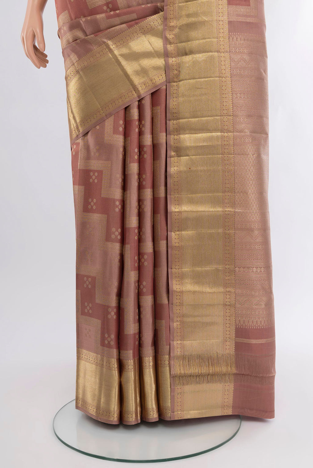 Pleats and pallu of Rose Gold Kanjivaram Silk Saree with Zari Brocade on the body and Zari Border. 