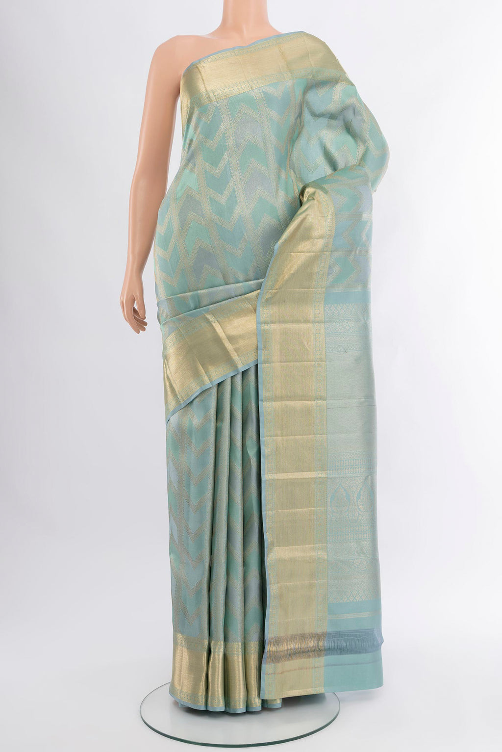 Light Blue Kanjivaram Silk Saree with Zari Brocade on the body and Zari Border.  displayed on a mannequin