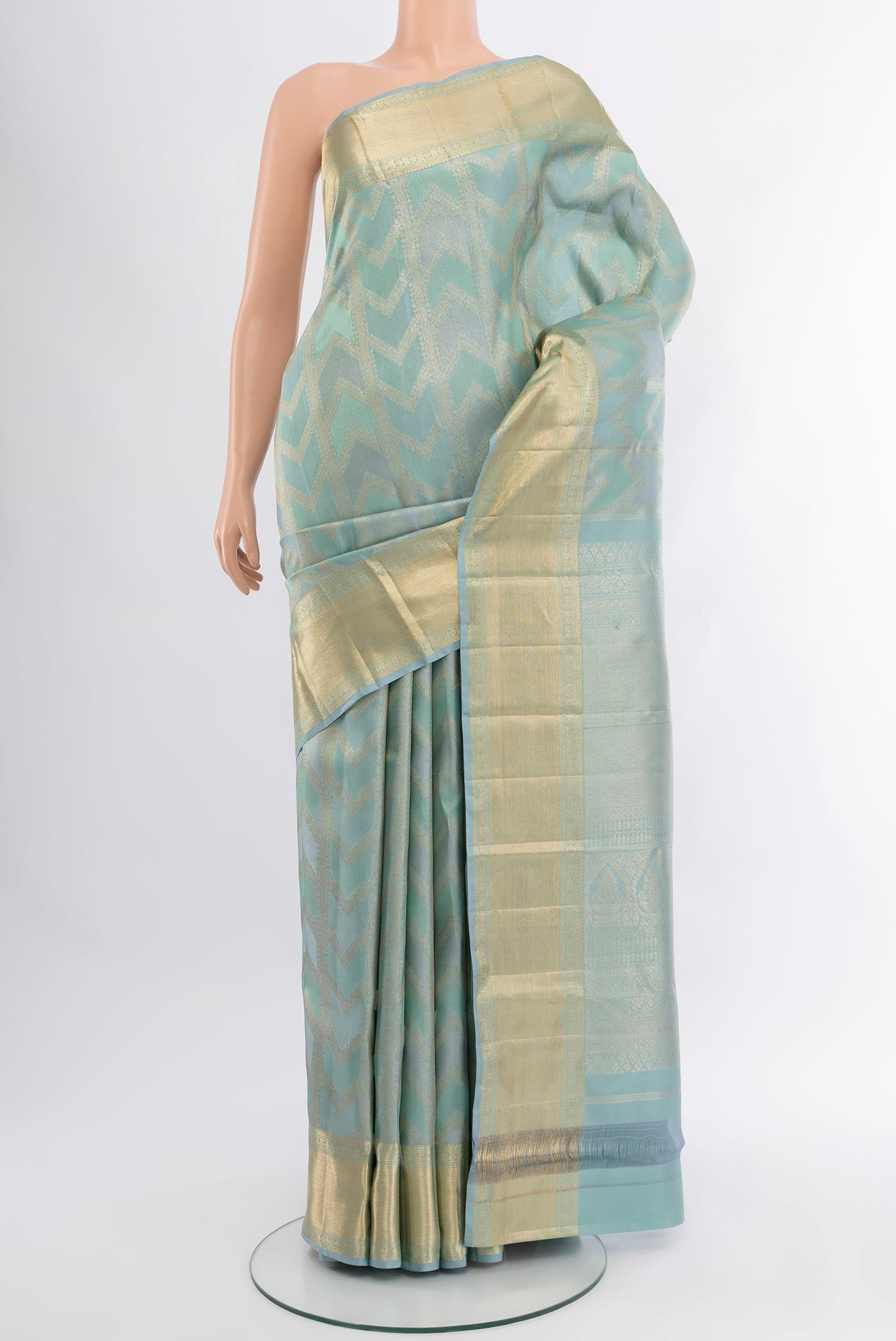 Light Blue Kanjivaram Silk Saree with Zari Brocade on the body and Zari Border.  displayed on a mannequin