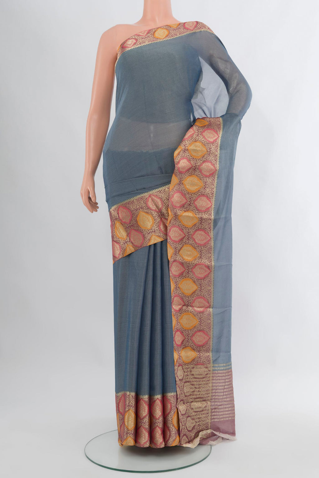 Blue Mysore Georgette Saree with Plain Body and Zari Border.  displayed on a mannequin