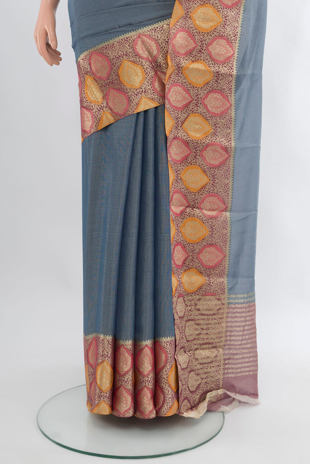 Pleats and pallu of Blue Mysore Georgette Saree with Plain Body and Zari Border. 