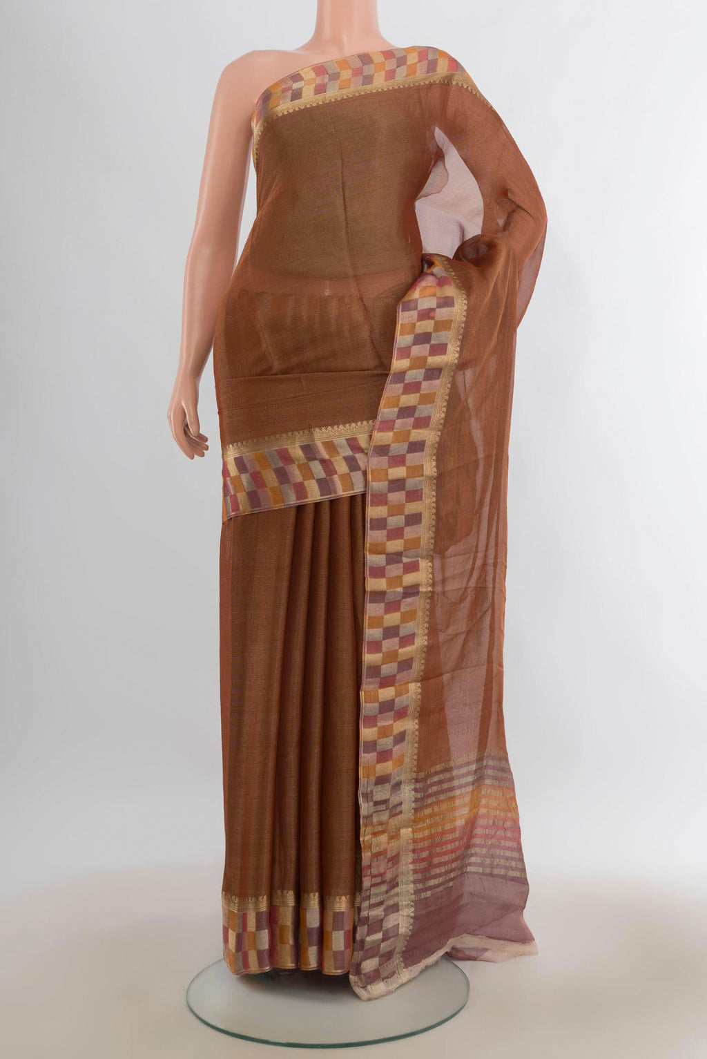 Bronze Mysore Georgette Saree with Plain Body and Fancy Border.  displayed on a mannequin