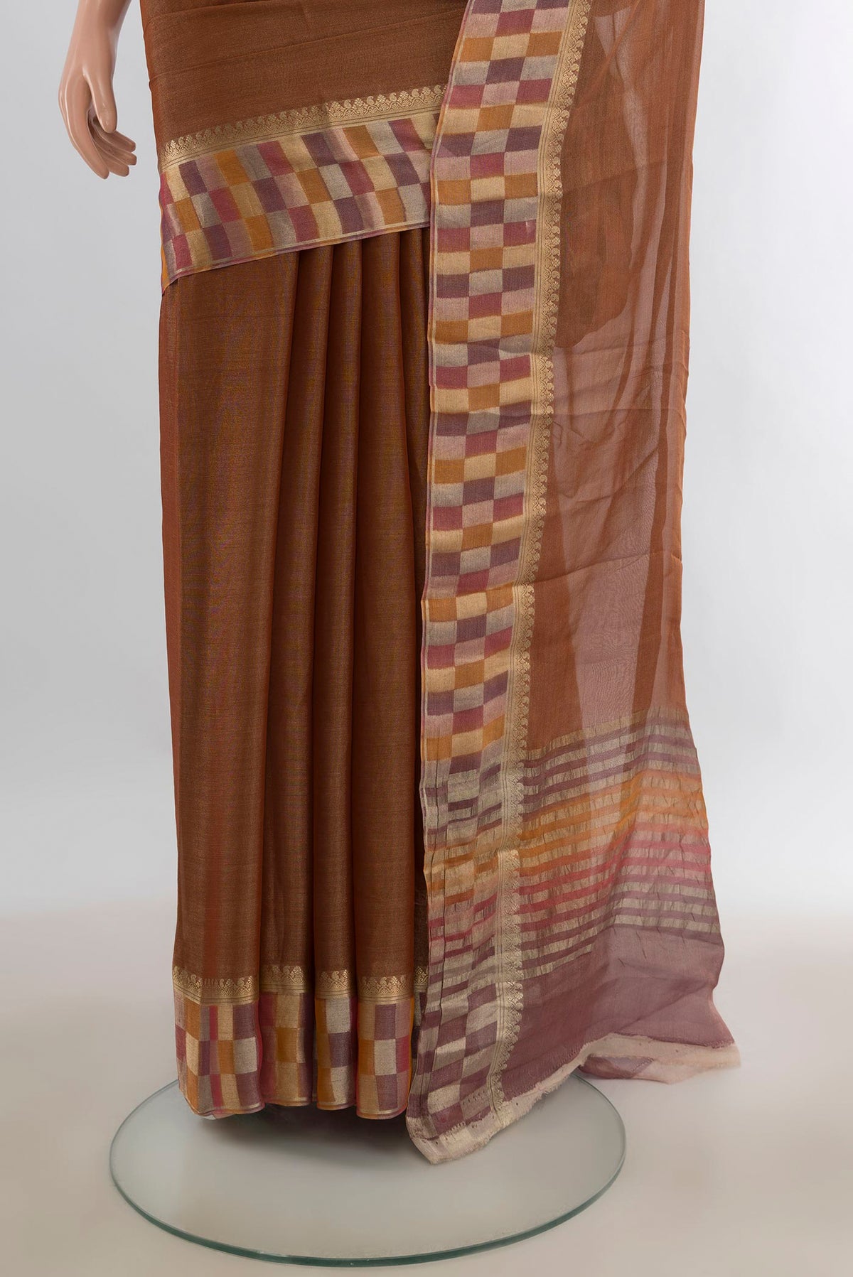 Pleats and pallu of Bronze Mysore Georgette Saree with Plain Body and Fancy Border. 