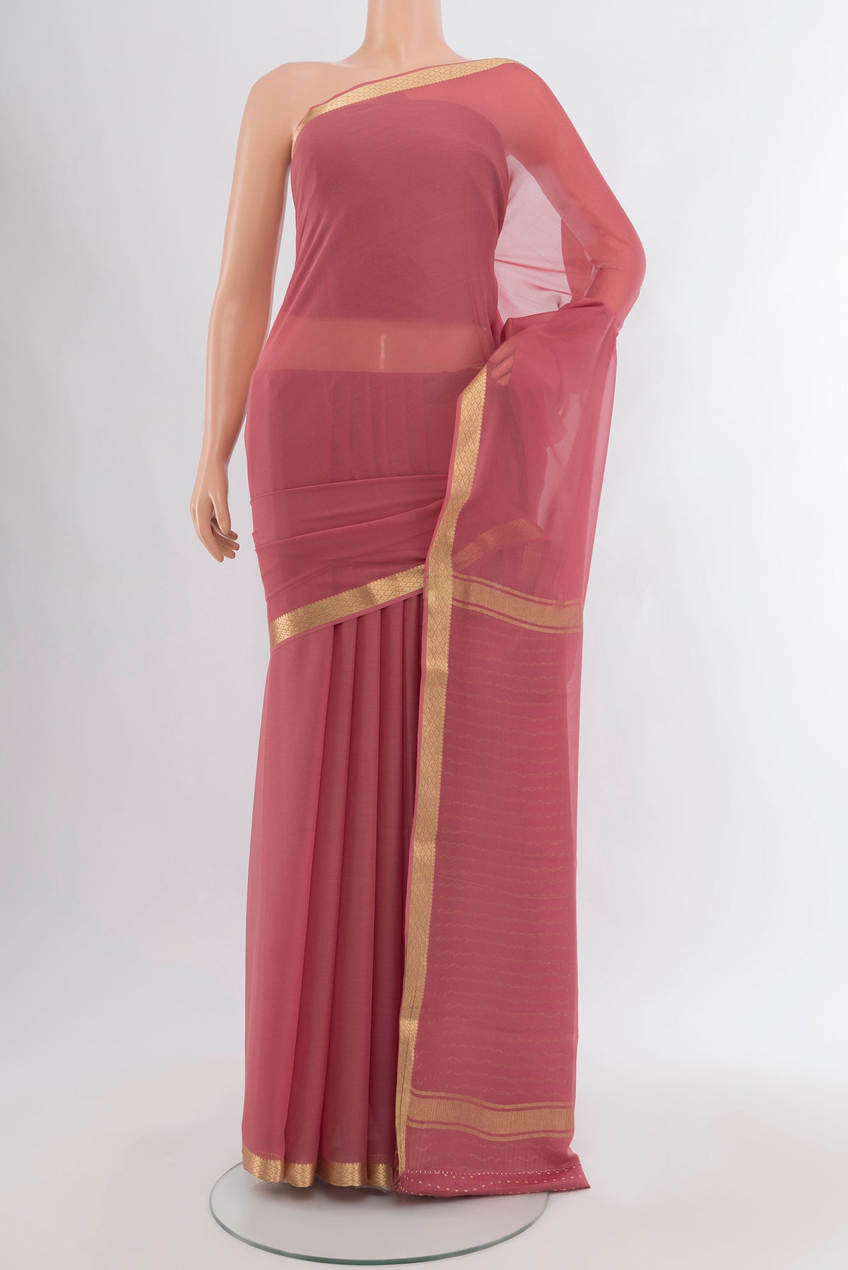 Pink Mysore Georgette Saree with Plain Body and Zari Border.  displayed on a mannequin