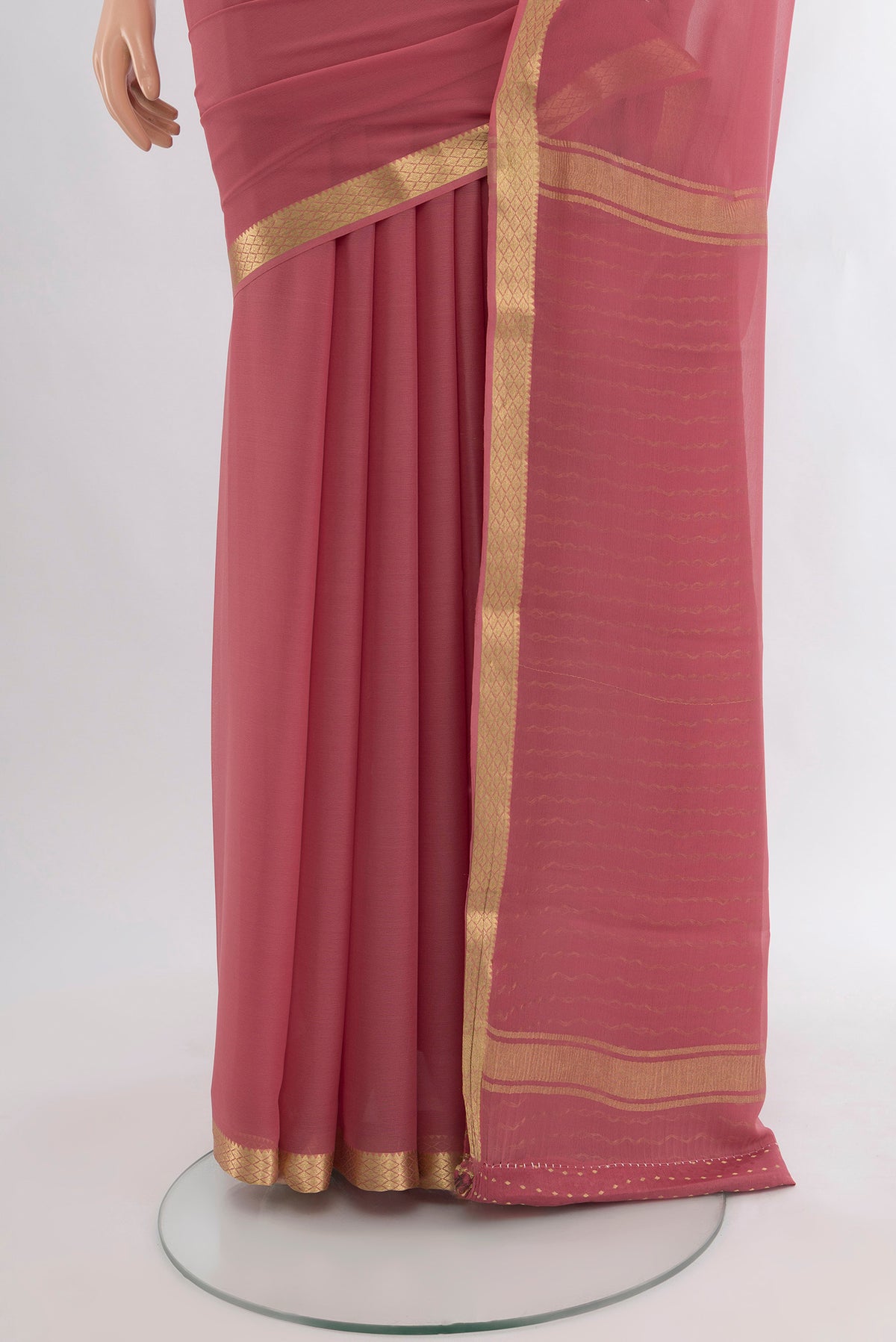 Pleats and pallu of Pink Mysore Georgette Saree with Plain Body and Zari Border. 