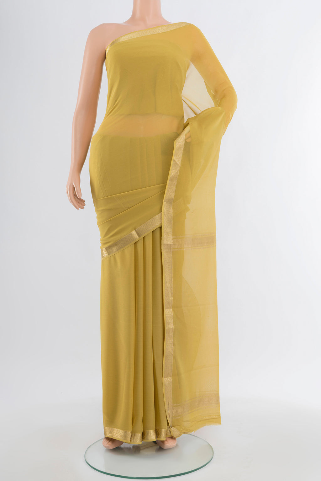 Light Green Mysore Georgette Saree with Plain Body and Silk Border.  displayed on a mannequin