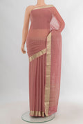 Rose Gold Mysore Georgette Saree with Embroidery on the body and Zari Border.  displayed on a mannequin