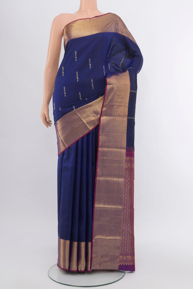 Dark Blue Kanchipuram Silk Saree with Checked design on the body and Silk Border.  displayed on a mannequin