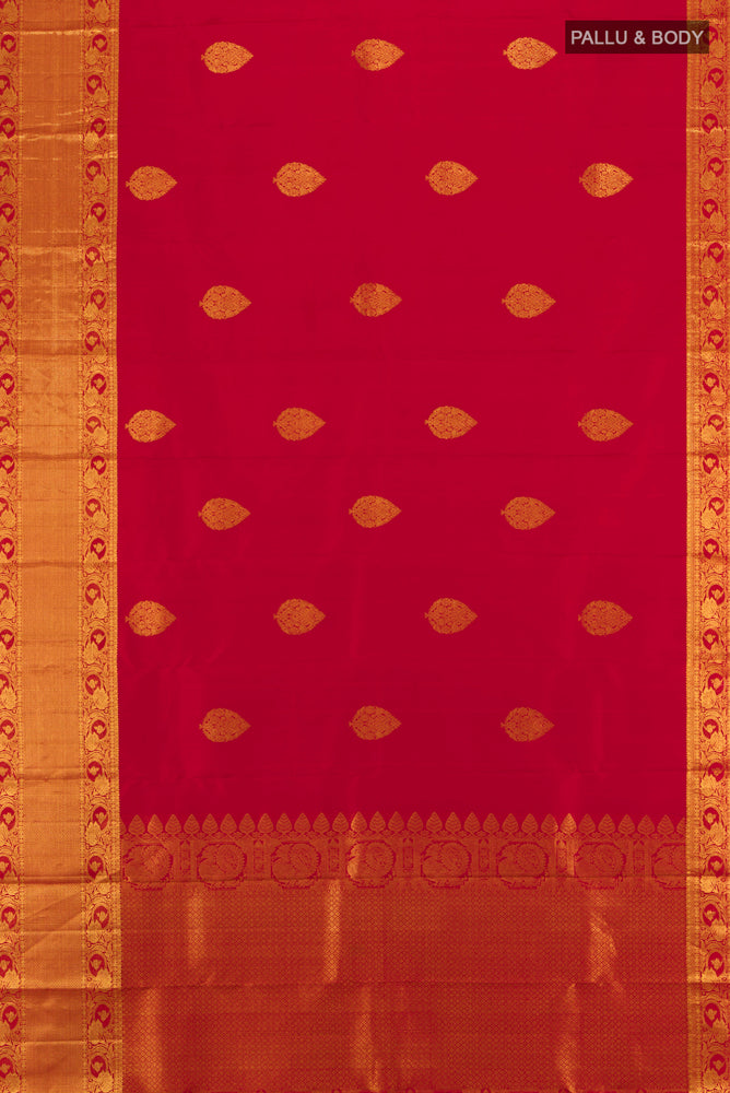 Flat view of Maroon Kanchipuram Silk Saree with Zari Butta on the body and Silk Border. 