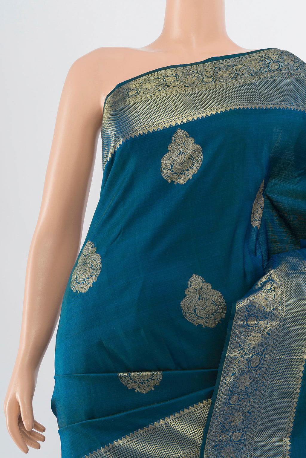 Border image of Dark Blue Kanchipuram Silk Saree with Zari Butta on the body and Silk Border. 