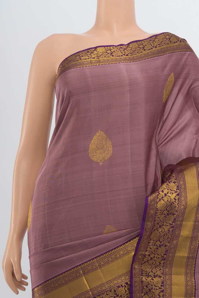 Border image of Bronze Kanchipuram Silk Saree with Zari Butta on the body and Silk Border. 