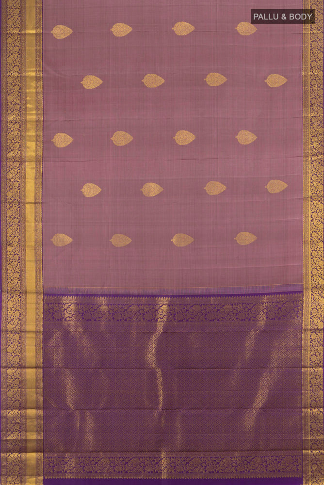 Flat view of Bronze Kanchipuram Silk Saree with Zari Butta on the body and Silk Border. 