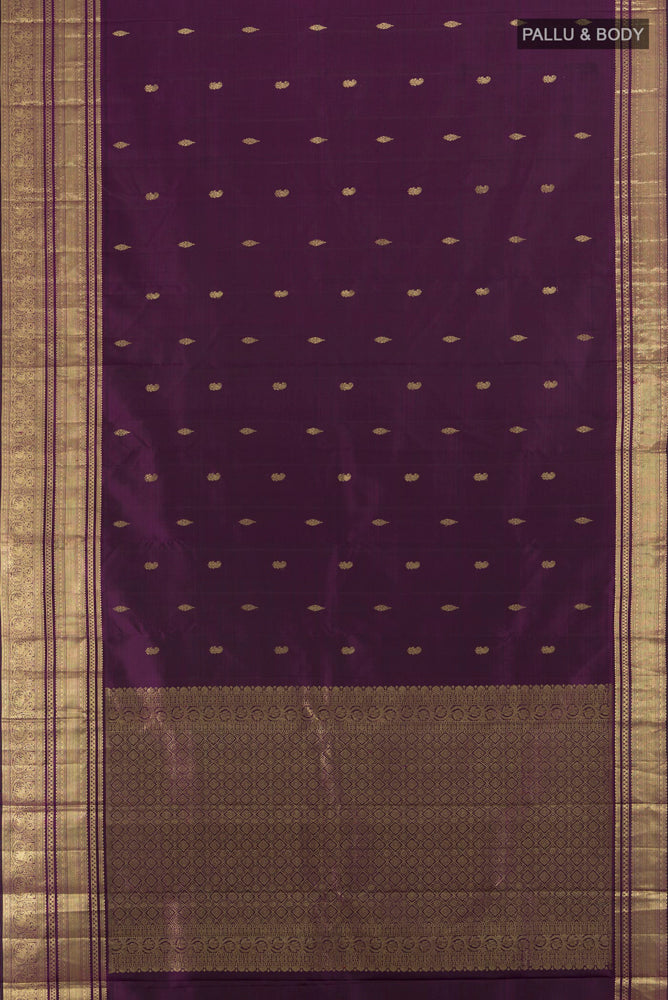 Flat view of Violet Kanjivaram Silk Saree with Zari Butta on the body and Silk Border. 