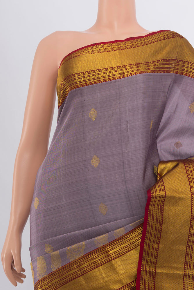 Border image of Lavender Kanjivaram Silk Saree with Zari Butta on the body and Silk Border. 