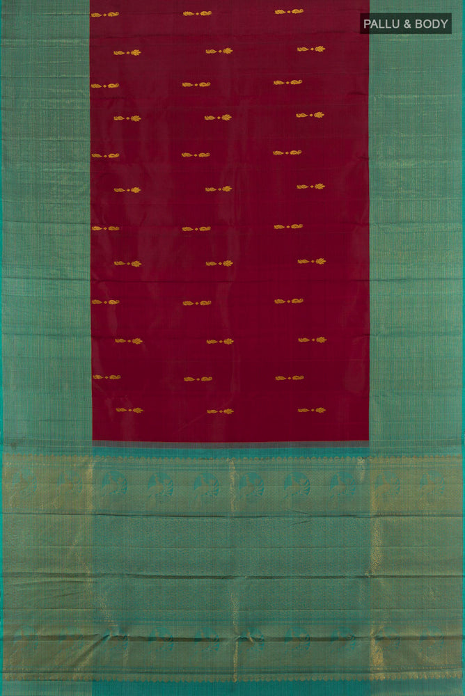 Flat view of Coffee Brown Kanjivaram Silk Saree with Zari Butta on the body and Silk Border. 