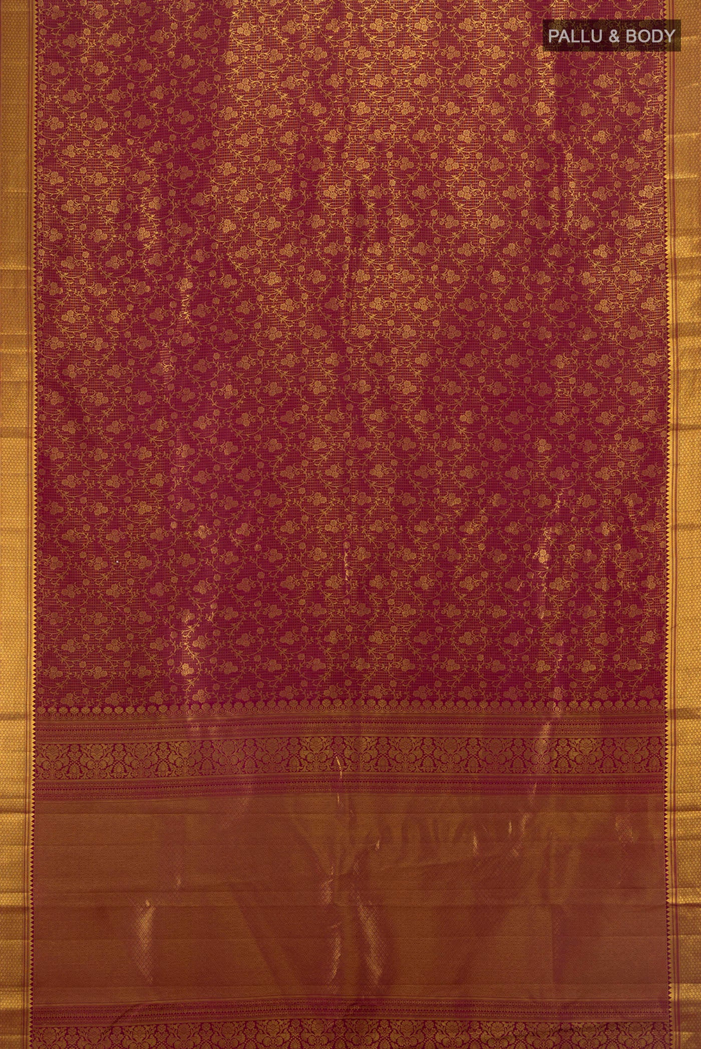 Flat view of Coffee Brown Kanchipuram Silk Saree with Zari Butta on the body and Silk Border. 