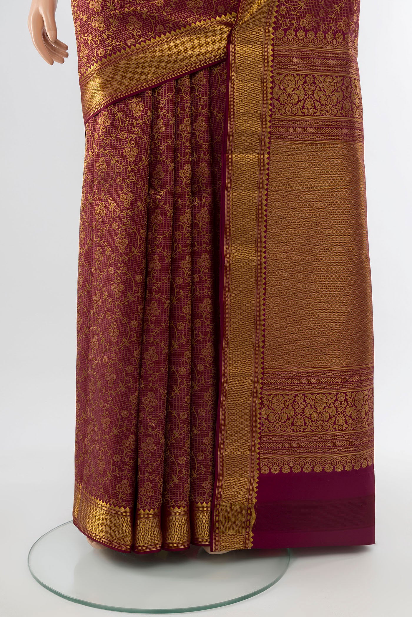 Pleats and pallu of Coffee Brown Kanchipuram Silk Saree with Zari Butta on the body and Silk Border. 