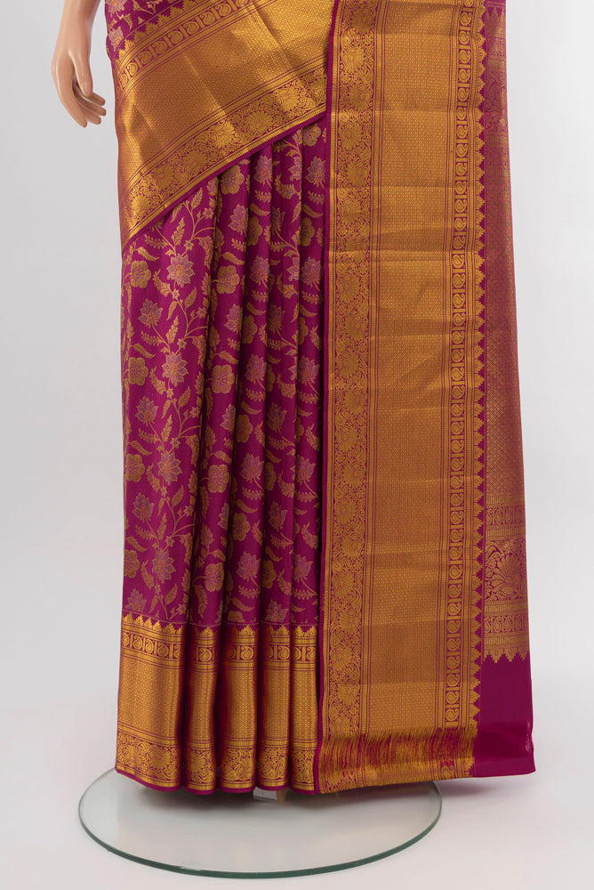Pleats and pallu of Dark Pink Kanjivaram Silk Saree with Zari Brocade on the body and Silk Border. 