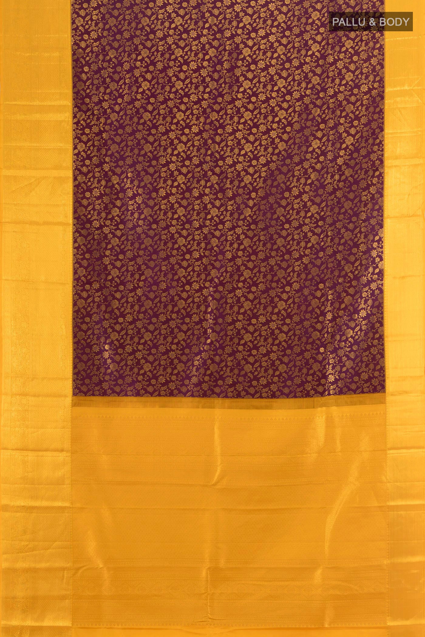 Flat view of Purple Kanjivaram Silk Saree with Zari Brocade on the body and Zari Border. 