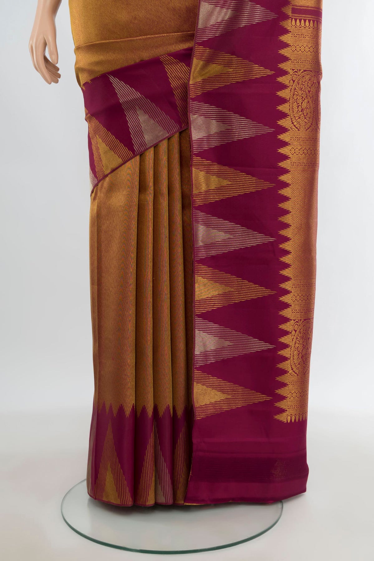 Pleats and pallu of Golden Kanjivaram Silk Saree with Zari Brocade on the body and Temple Border. 