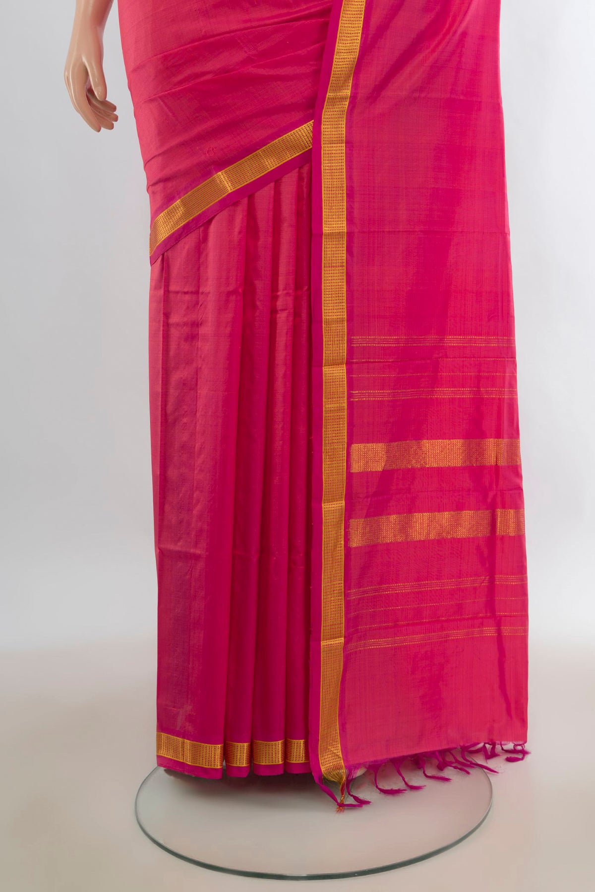 Pleats and pallu of Pure Silk Pink Kanjivaram Saree with Plain Body and Zari Border. 