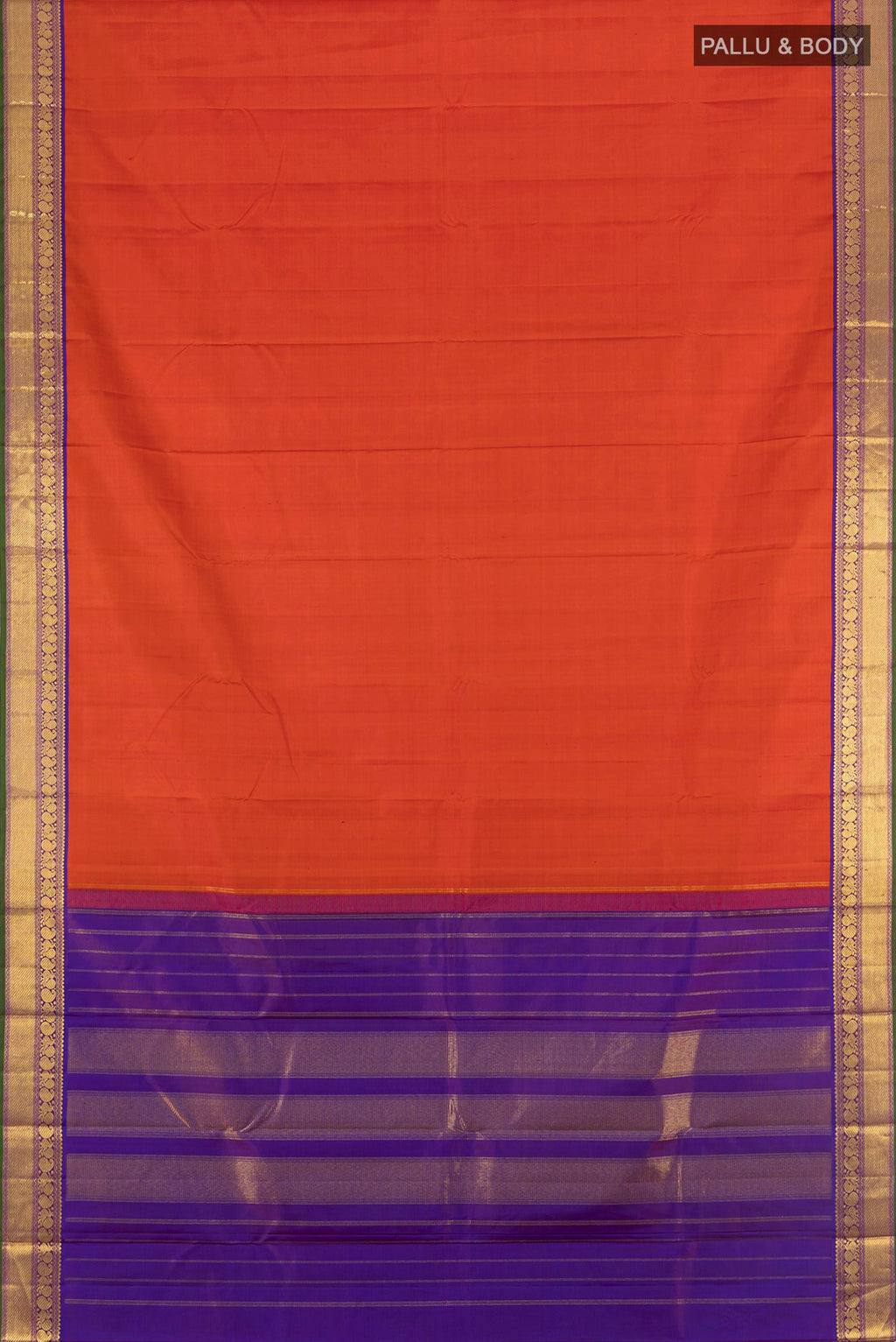 Flat view of Rust Kanchipuram Silk Saree with Zari Butta on the body and Zari Border. 
