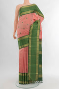 Pink Kanchipuram Silk Saree with Thread Butta on the body and Zari Border.  displayed on a mannequin