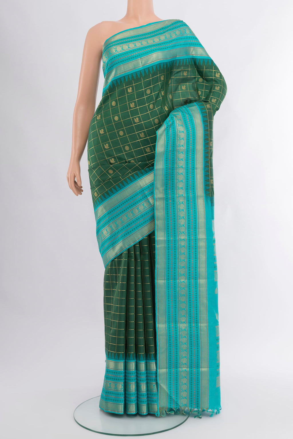 Bottle Green Kanchipuram Silk Saree with Checked design on the body and Zari Border.  displayed on a mannequin