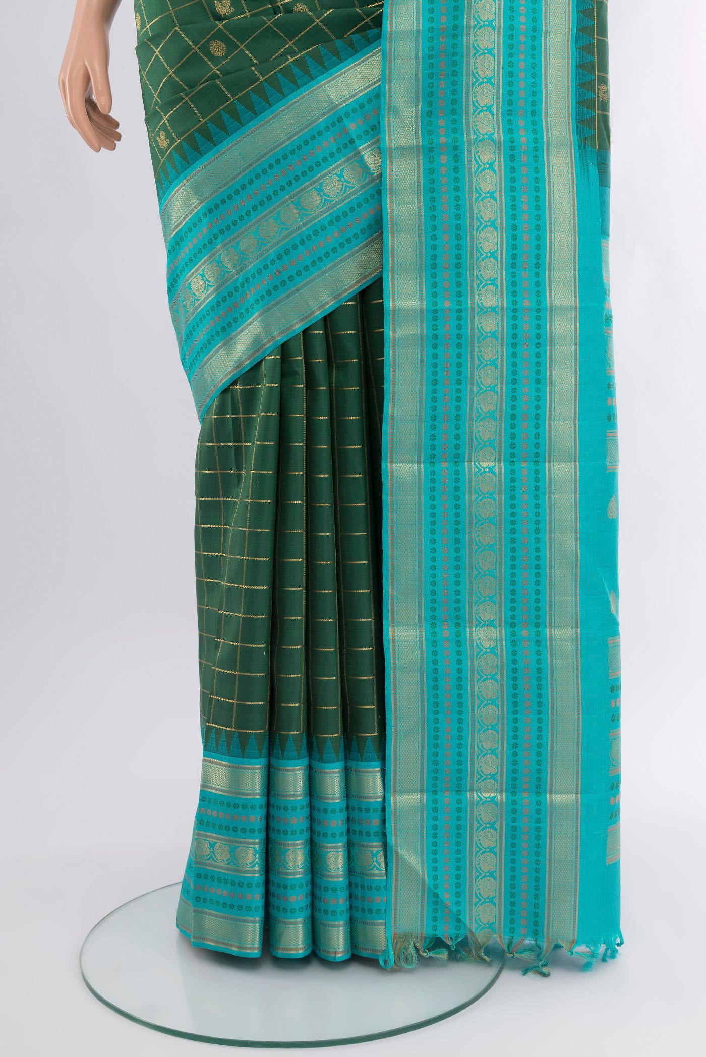 Pleats and pallu of Bottle Green Kanchipuram Silk Saree with Checked design on the body and Zari Border. 