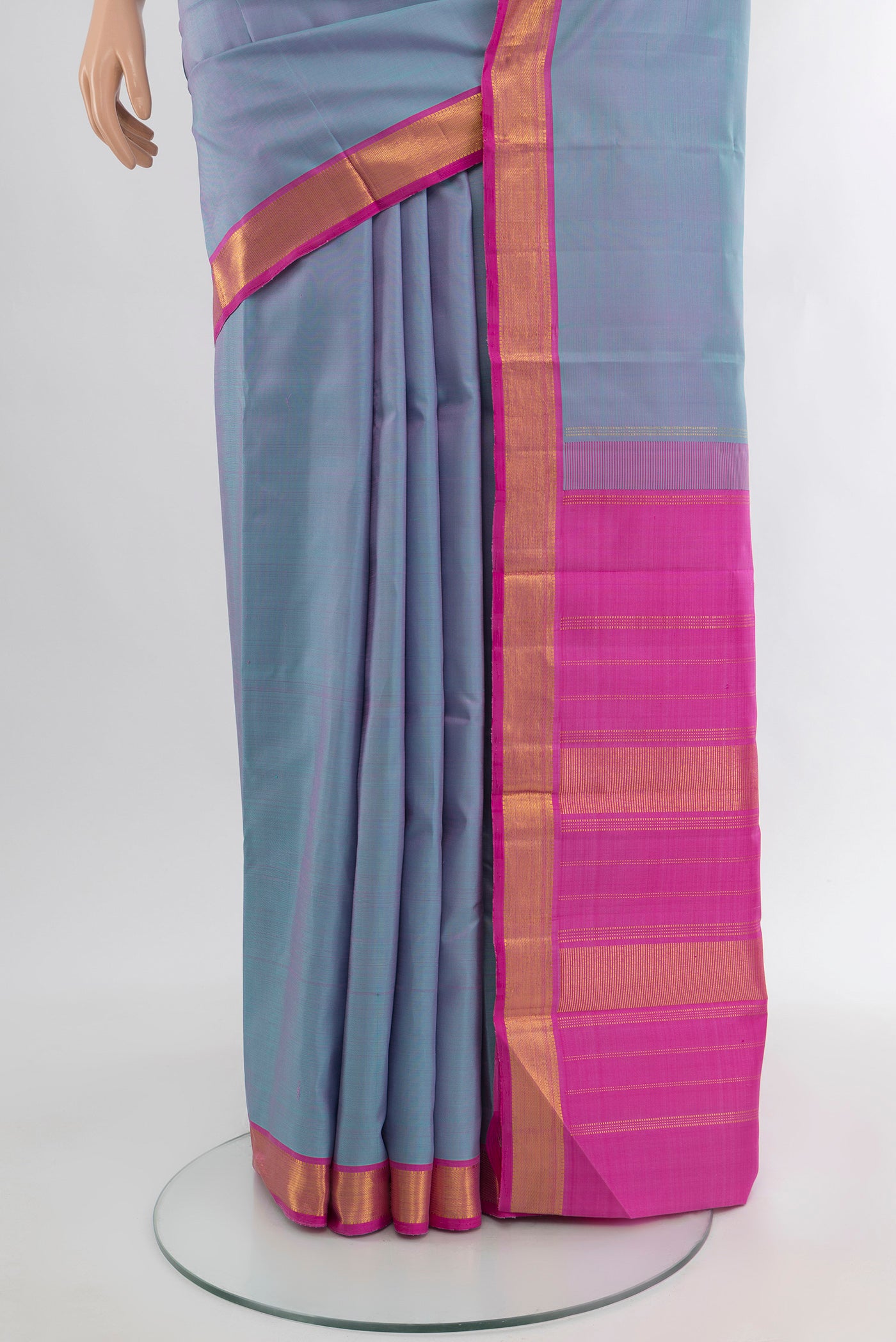 Pleats and pallu of Lavender Kanjivaram Silk Saree with Plain Body and Zari Border. 