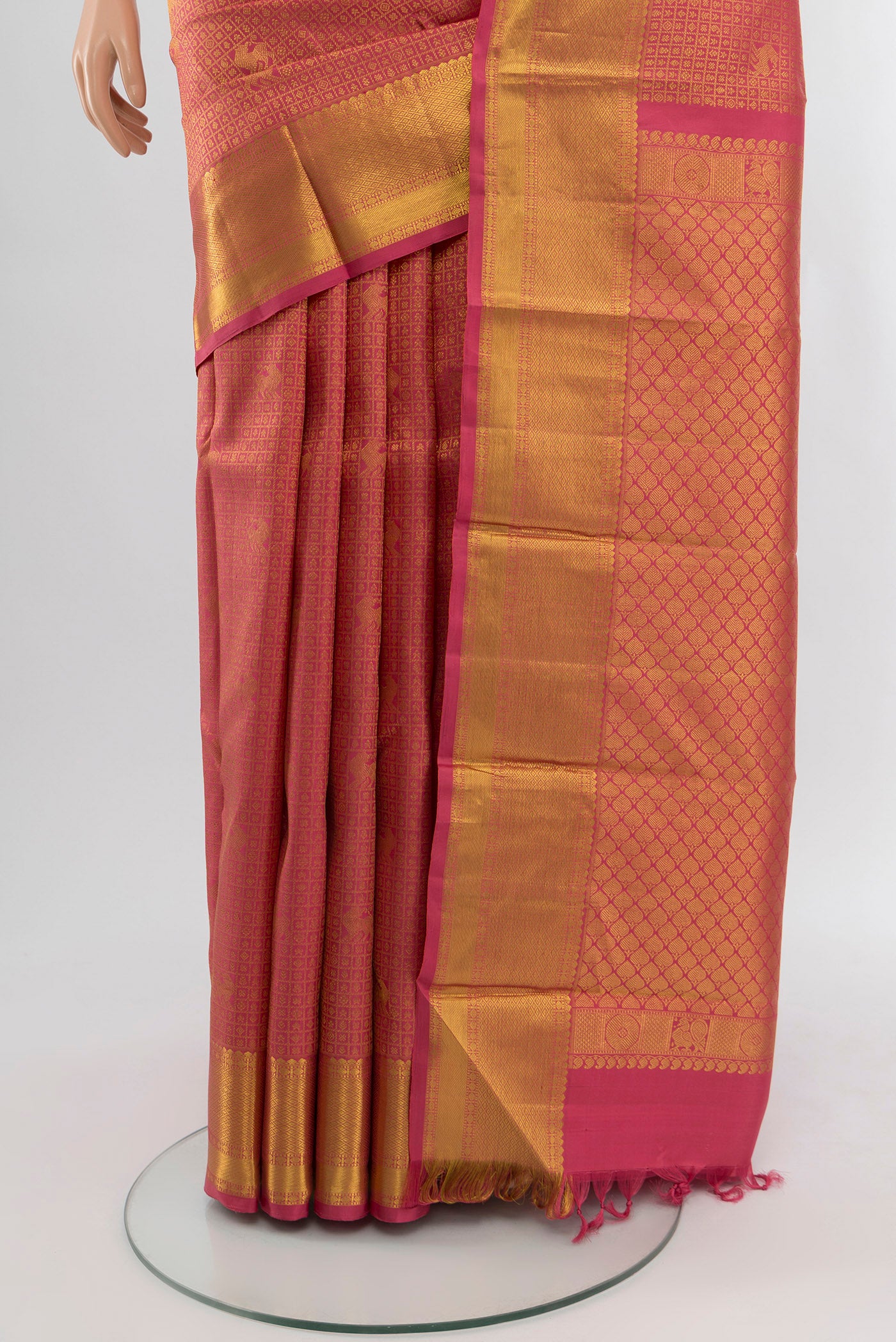 Pleats and pallu of Pink Kanchipuram Silk Saree with Zari Brocade on the body and Zari Border. 