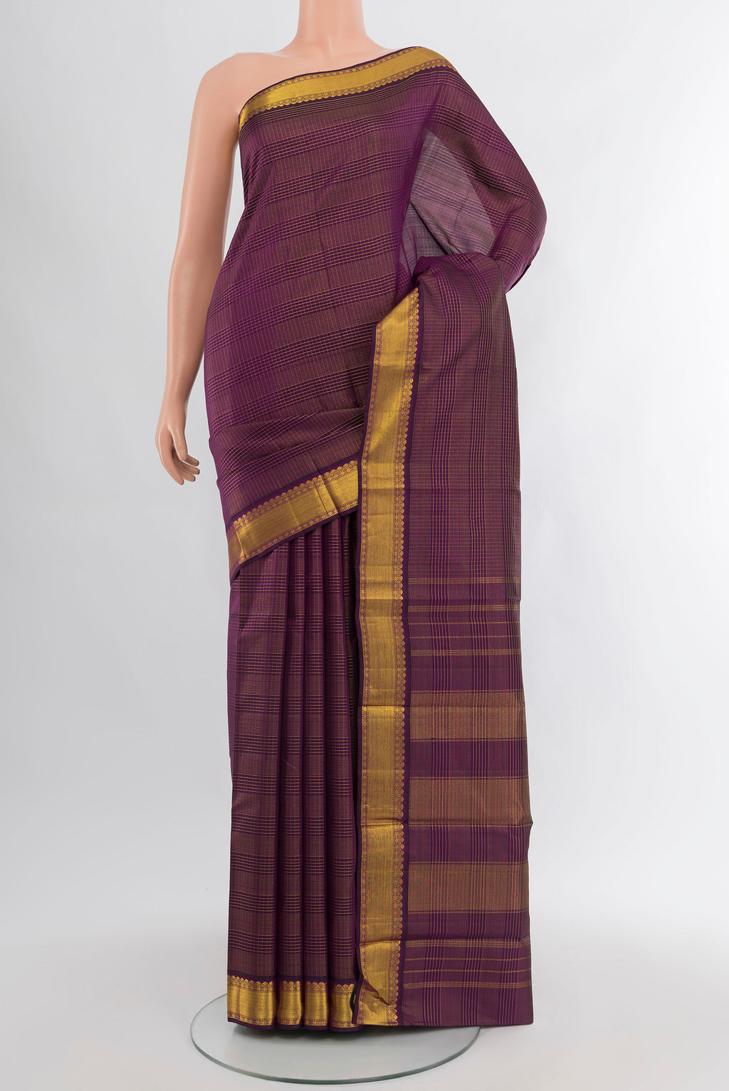 Purple Kanjivaram Silk Saree with Stripes on the body and Zari Border.  displayed on a mannequin