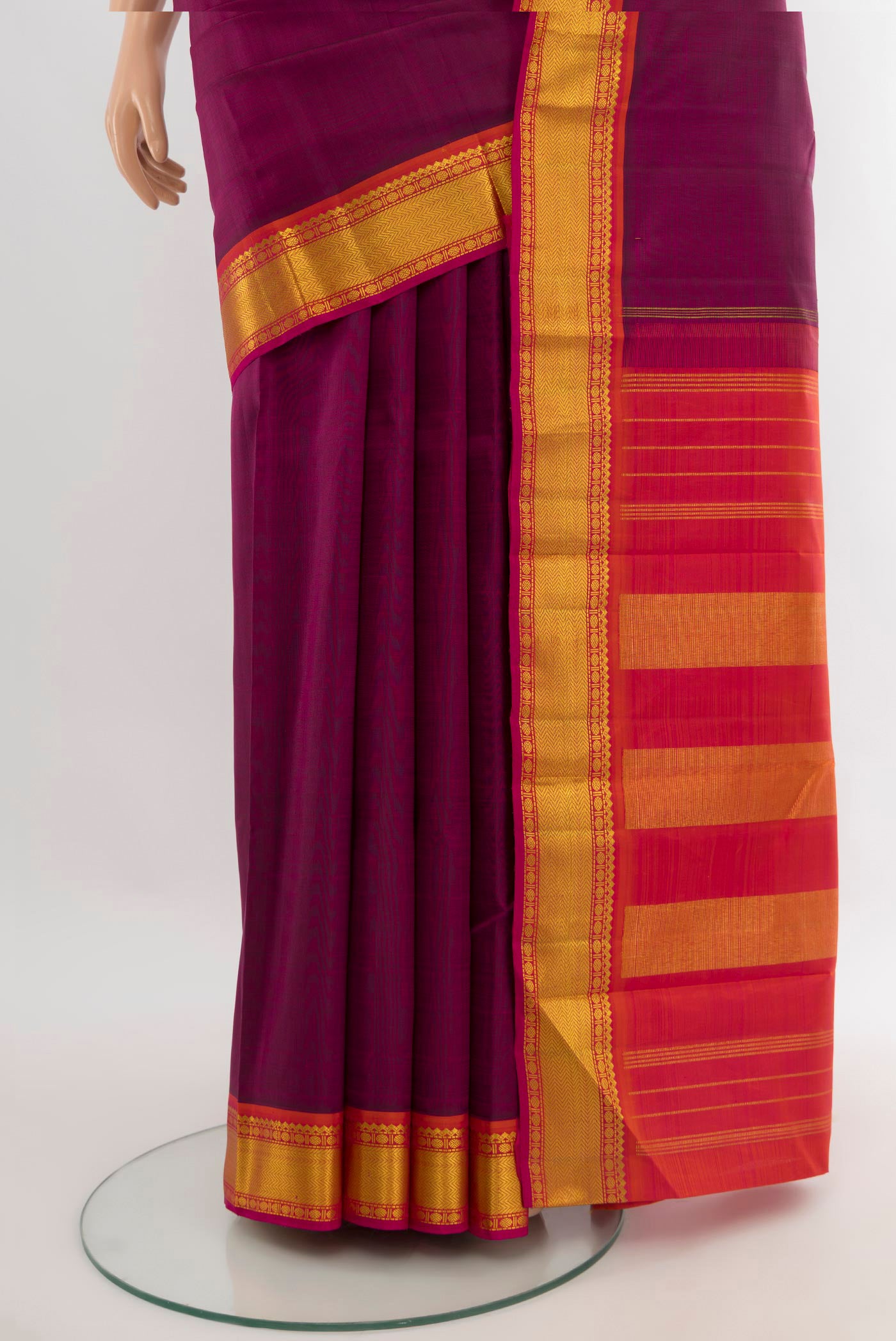 Pleats and pallu of Purple Kanchipuram Silk Saree with Plain Body and Zari Border. 