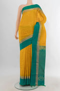 Pure Silk Mustard Soft Saree with Zari Butta on the body and Plain Border.  displayed on a mannequin