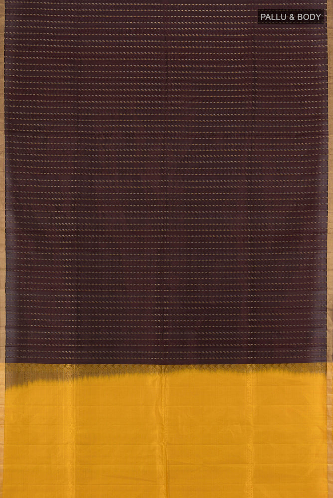 Flat view of Coffee Brown Soft Silk Saree with Zari Butta on the body and Silk Border. 