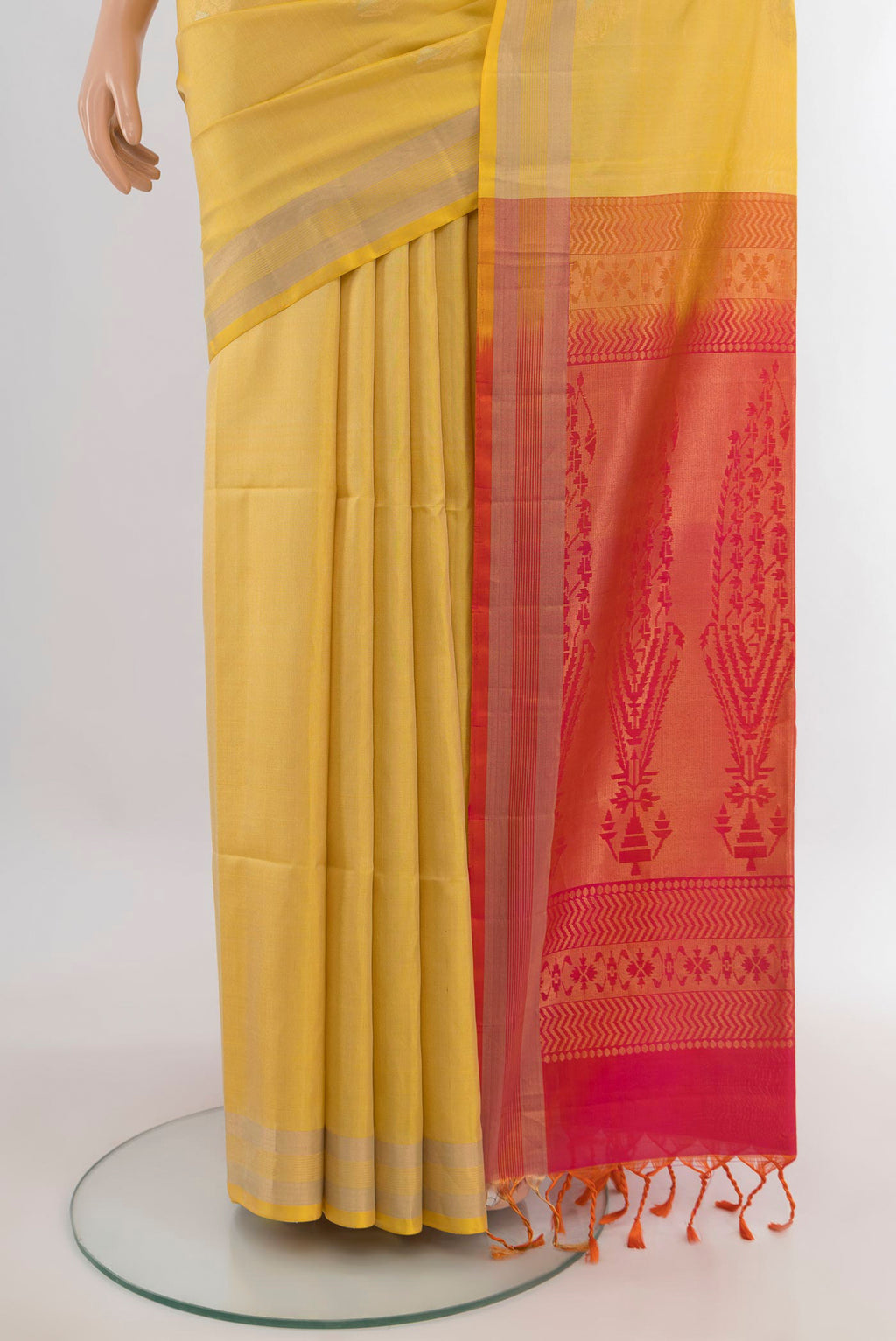 Pleats and pallu of Pure Silk Lemon Yellow Soft Saree with Zari Butta on the body and Zari Border. 