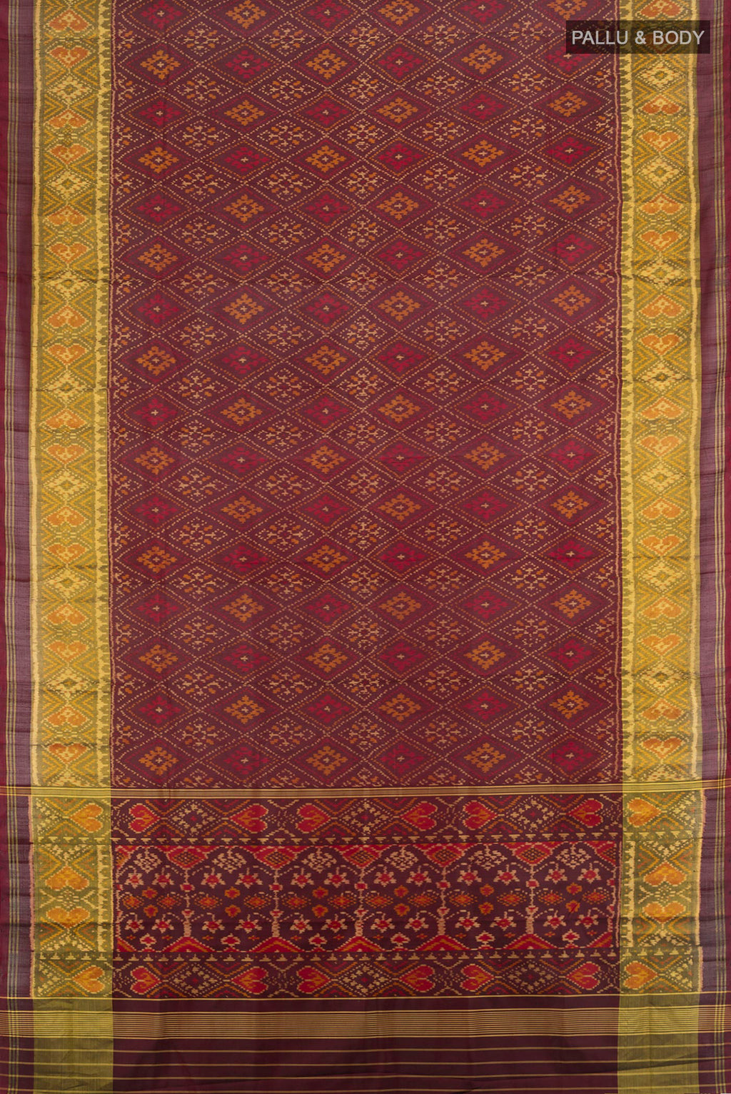 Flat view of Coffee Brown Rajkot Patola Silk Saree with Pure Ikat on the body and Ikat Border. 