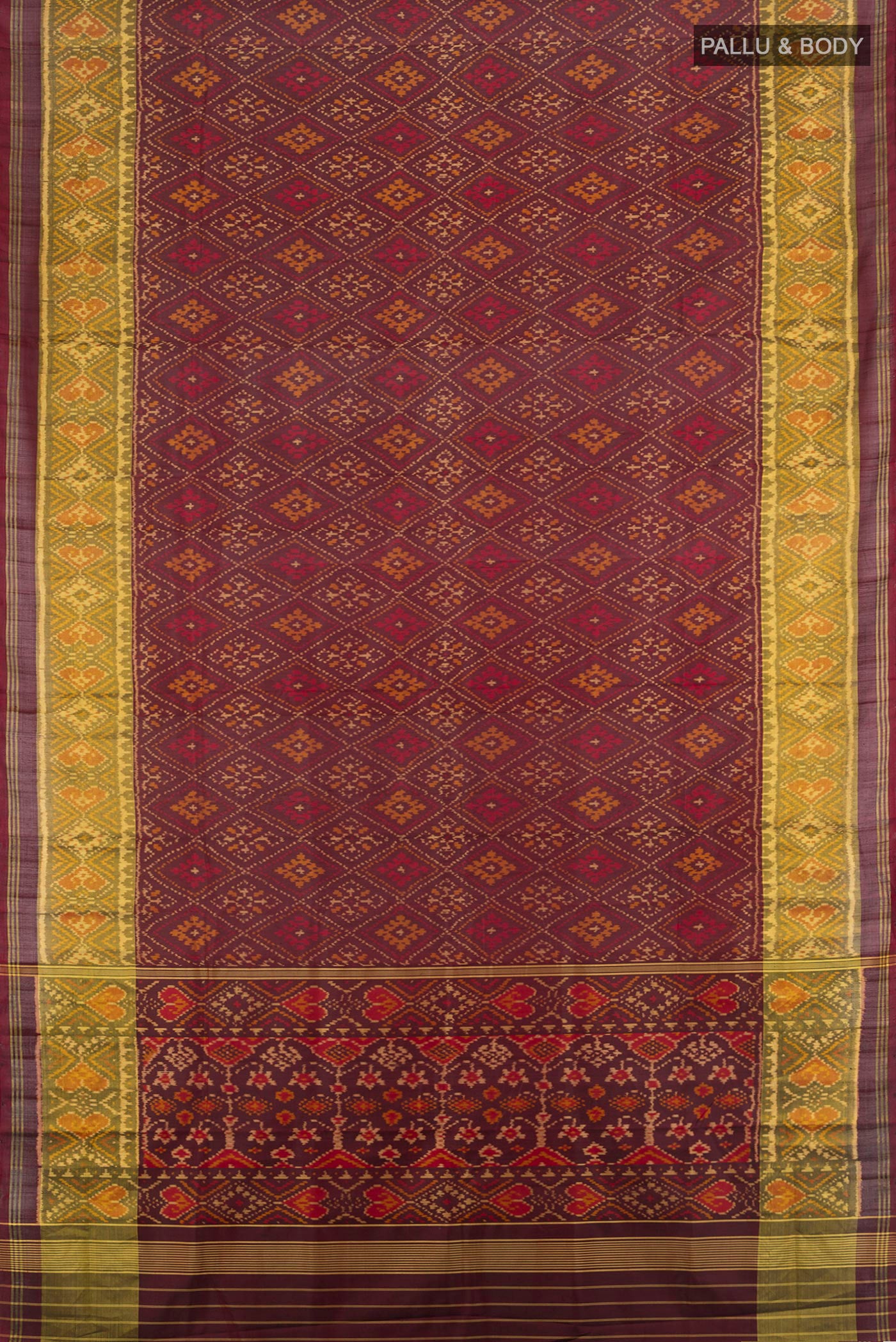 Flat view of Coffee Brown Rajkot Patola Silk Saree with Pure Ikat on the body and Ikat Border. 