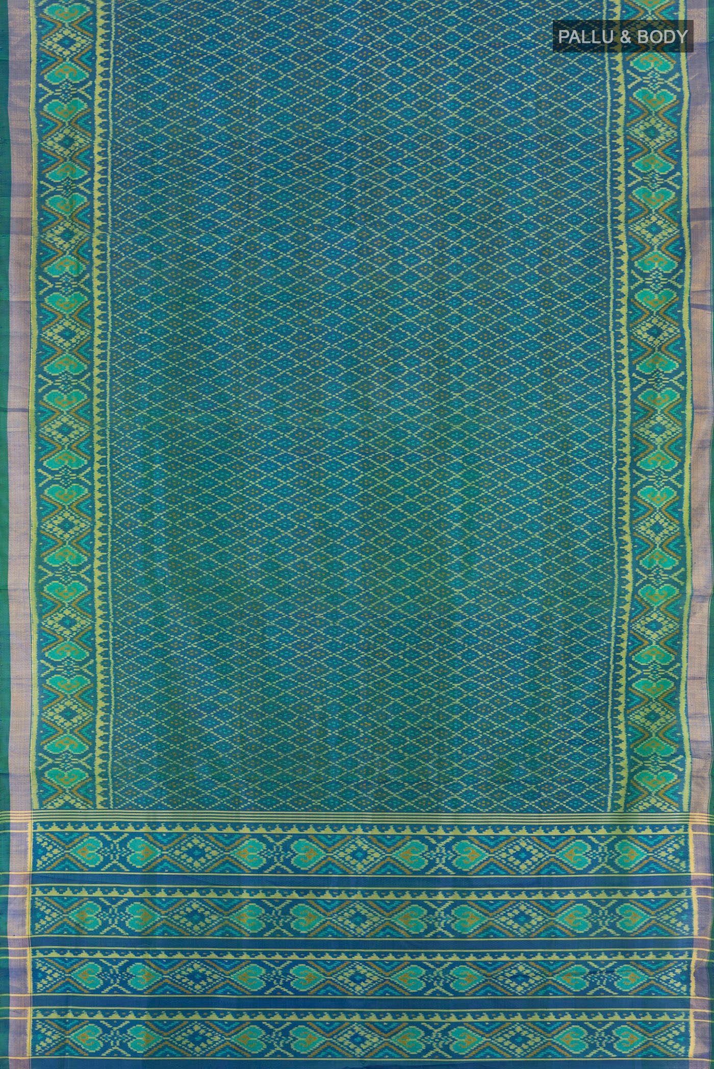 Flat view of Peacock Blue Dual Tone Rajkot Patola Silk Saree with Pure Ikat on the body and Ikat Border. 
