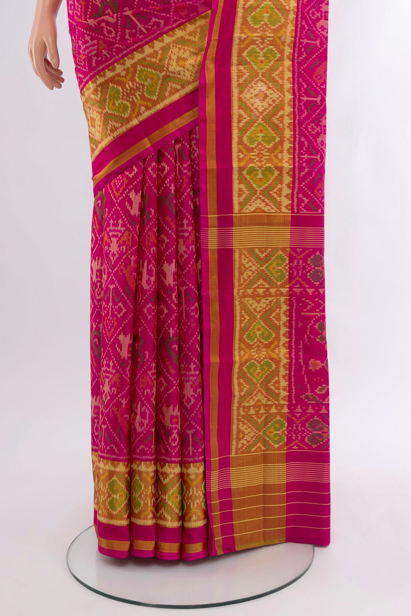 Pleats and pallu of Pink Rajkot Patola Silk Saree with Pure Ikat on the body and Ikat Border. 
