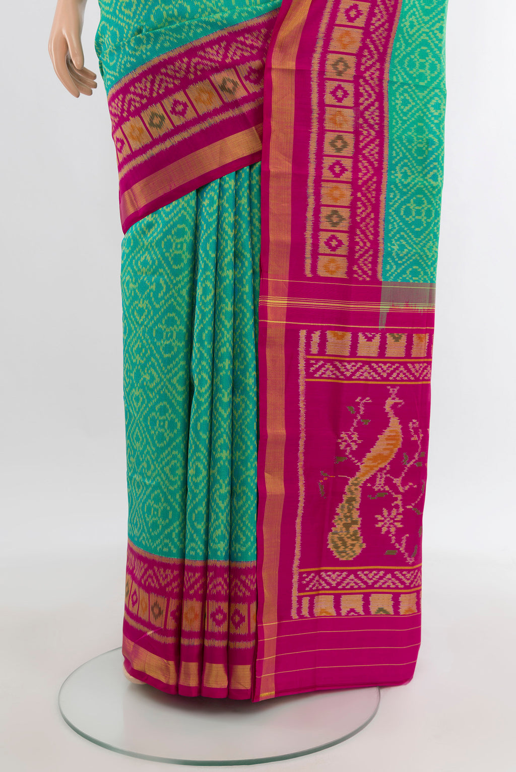 Pleats and pallu of Sea Green Rajkot Patola Silk Saree with Pure Ikat on the body and Ikat Border. 