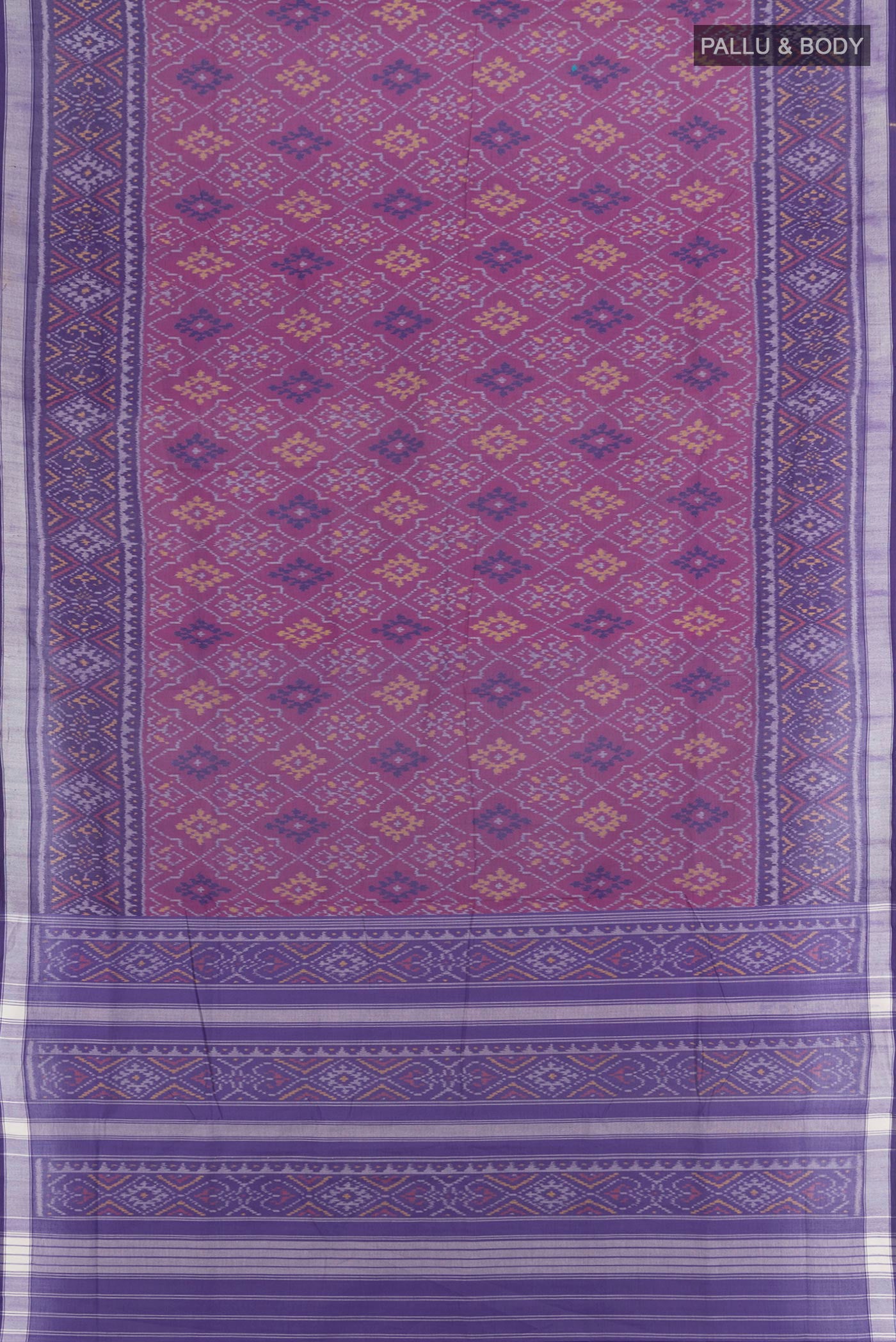 Flat view of Purple Rajkot Patola Silk Saree with Ikat design on the body and Ikat Border. 