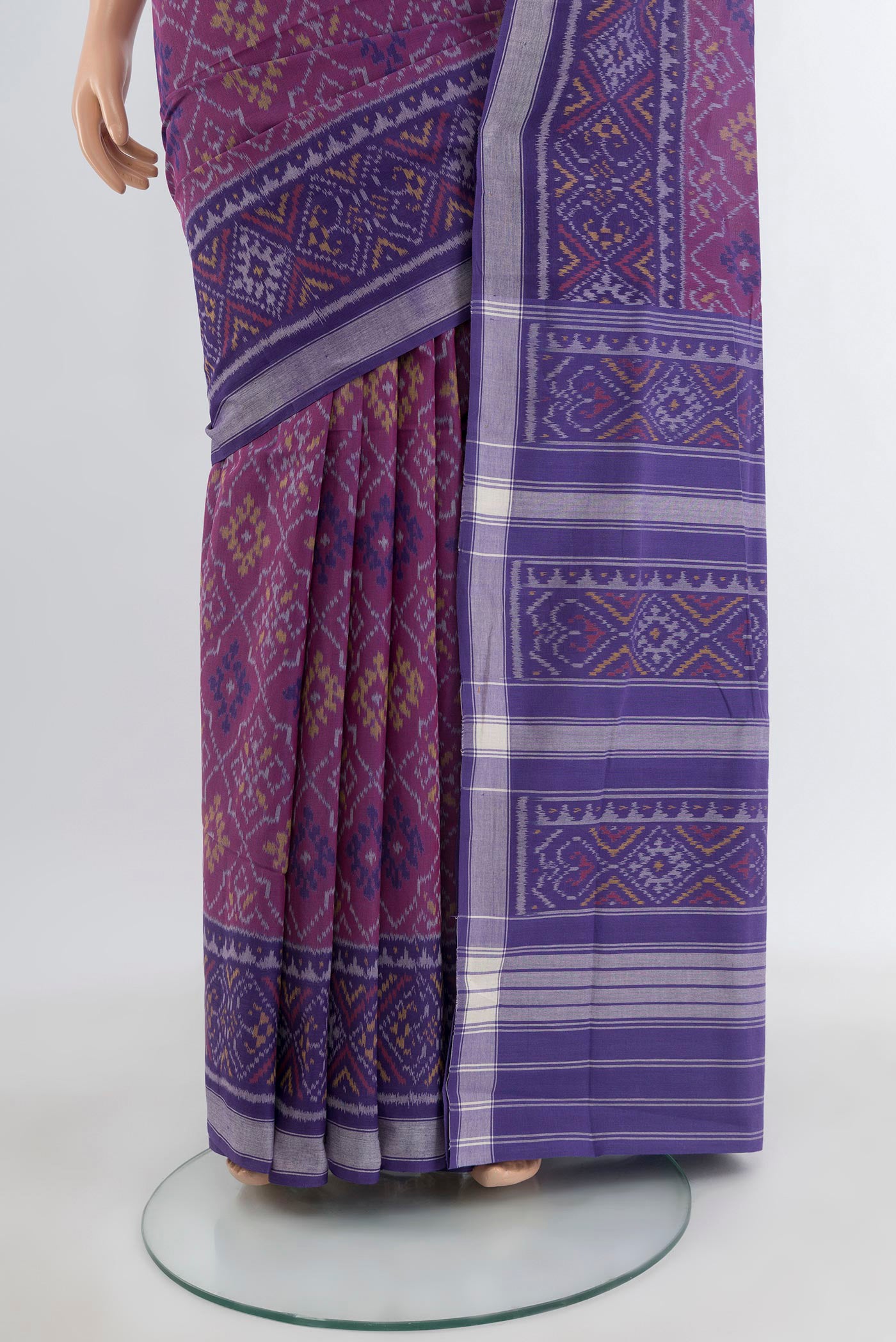Pleats and pallu of Purple Rajkot Patola Silk Saree with Ikat design on the body and Ikat Border. 
