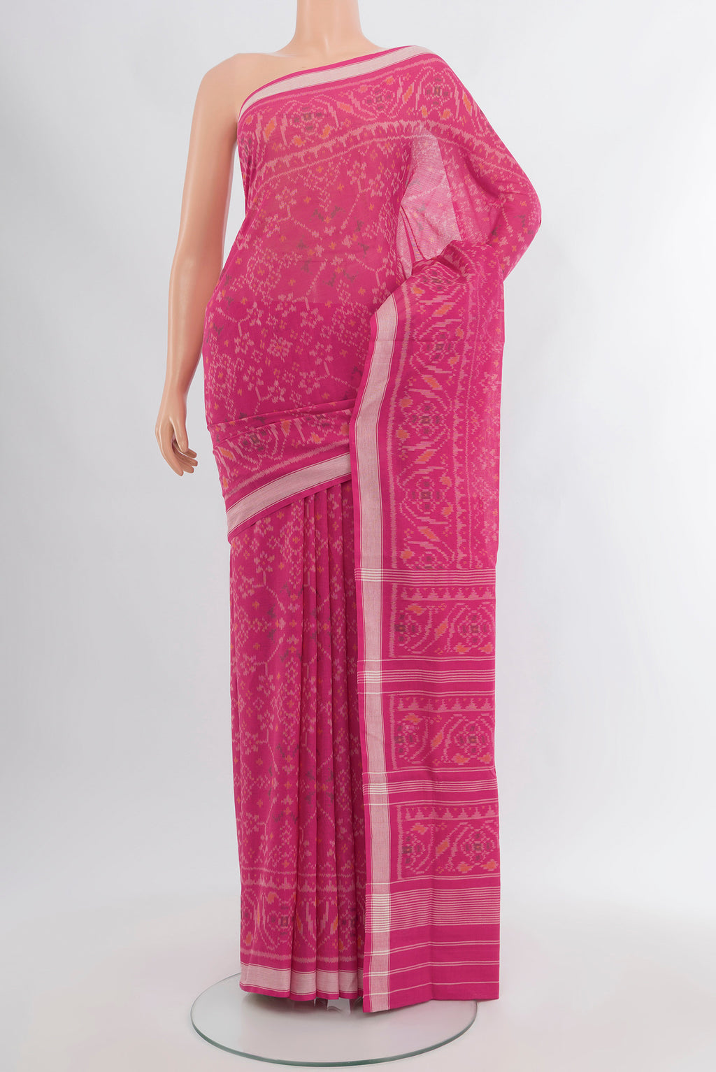 Pink Pochampally Cotton Saree with Ikat design on the body and Ikat Border.  displayed on a mannequin