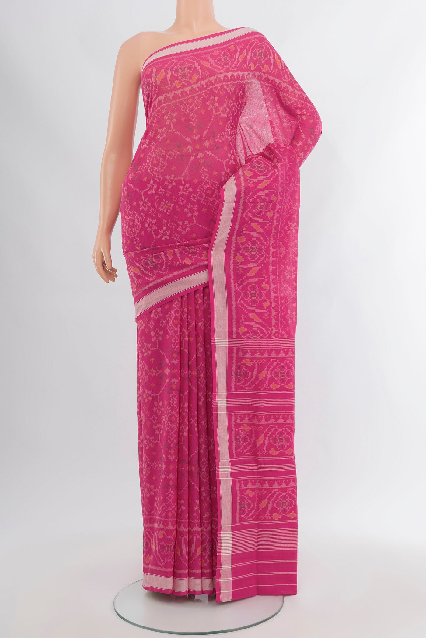 Pink Pochampally Cotton Saree with Ikat design on the body and Ikat Border.  displayed on a mannequin