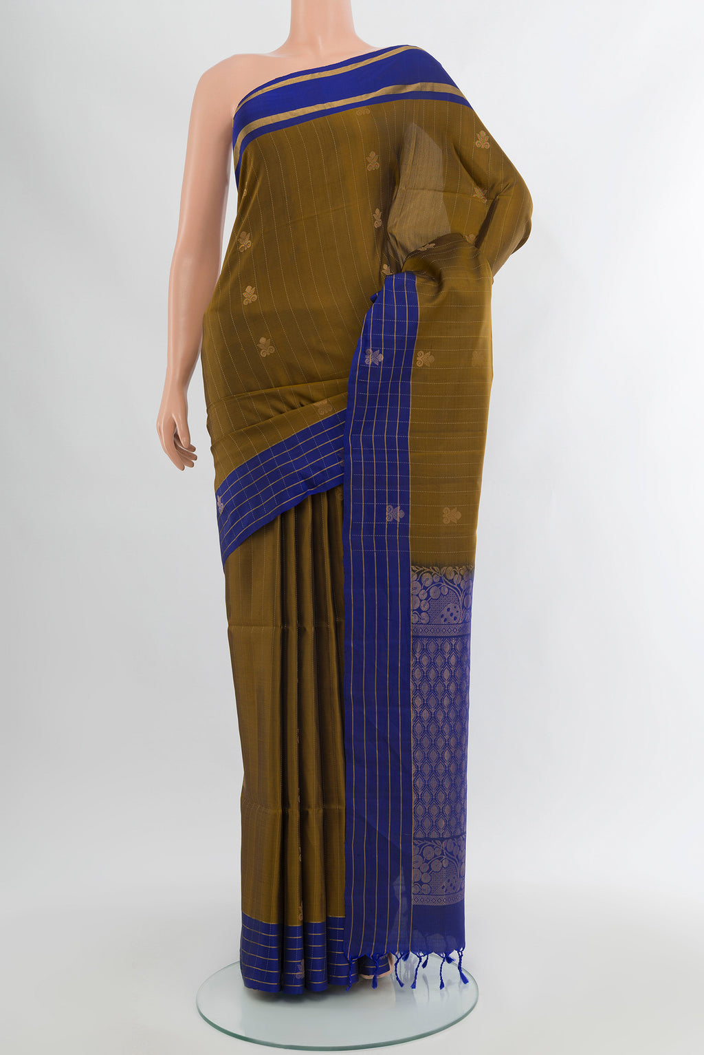 Mehandi Green Soft Silk Saree with Zari Butta on the body and Silk Border.  displayed on a mannequin